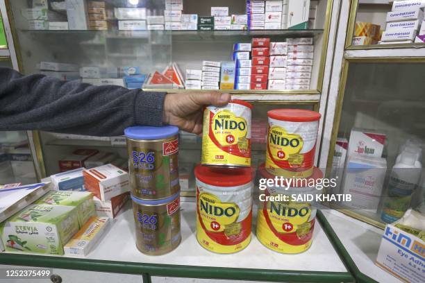 38 Cans Of Powdered Milk Stock Photos, High-Res Pictures, and Images ...