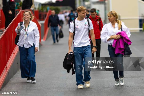 Mick Schumacher, his mother Corinna Schumacher and his manager Sabine Kehm arrive at the track during the F1 Grand Prix of Azerbaijan at Baku City...