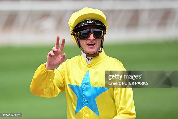 Lucky Sweynesse trained by Manfred K. L. Man and ridden by Zac Purton, celebrates winning the Group 1 The Chairman's Sprint Prize at Sha Tin...