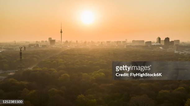 golden sunset over berlin cityscape and volkspark friedrichshain park, germany - the tiergarten stock pictures, royalty-free photos & images