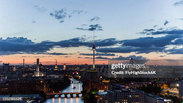 television tower and berlin cityscape illuminated at night, germany - berlin night stock pictures, royalty-free photos & images