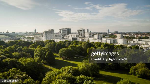 sunny hirschgarten and munich cityscape, bavaria, germany - munich cityscape stock pictures, royalty-free photos & images