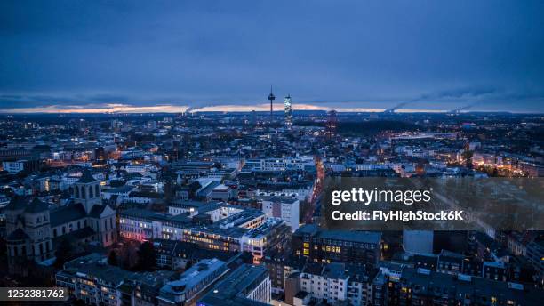 cologne cityscape and colonius tv tower at night, germany - cologne skyline stock pictures, royalty-free photos & images