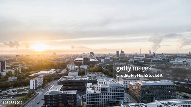 cologne cityscape at sunset, germany - cologne skyline stock pictures, royalty-free photos & images