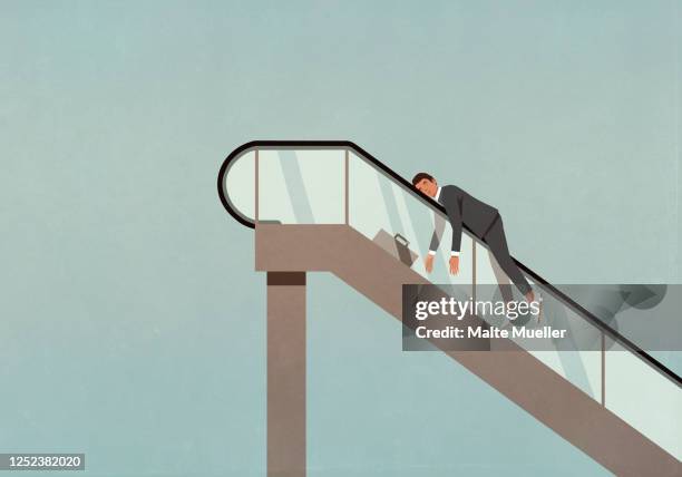 exhausted businessman on ascending escalator - beförderung arbeit stock-grafiken, -clipart, -cartoons und -symbole