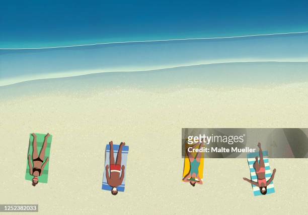 people in protective face masks sunbathing and social distancing on sunny beach - sonnig stock-grafiken, -clipart, -cartoons und -symbole