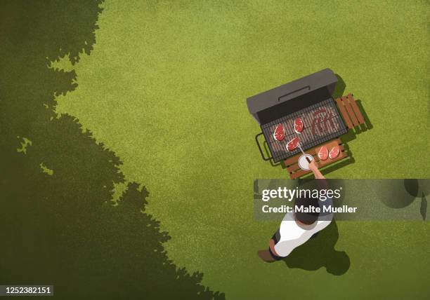 view from above man barbecuing steaks at grill in backyard - steak stock-grafiken, -clipart, -cartoons und -symbole
