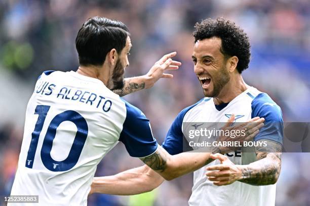 Lazio's Brazilian forward Felipe Anderson celebrates scoring his team's first goal during the Italian Serie A football match between Inter Milan and...