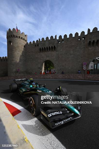 Aston Martin's Spanish driver Fernando Alonso steers his car during the Formula One Azerbaijan Grand Prix at the Baku City Circuit in Baku on April...