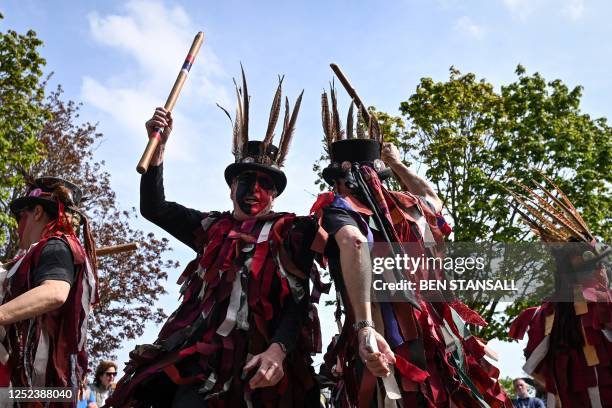 Members of the Dark Horse Morris dancing team take part in the 2023 Sweeps Festival in Rochester, south-east of London, on April 30, 2023. - The...