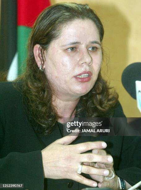 Fadwa, the wife of jailed Palestinian Marwan Barghuti, speaks during a press conference in the West Bank city of Ramallah 14 August 2002, following...