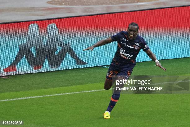 Montpellier's French defender Faitout Maouassa celebrates after he scored the second goal for his team during the French L1 football match between AS...