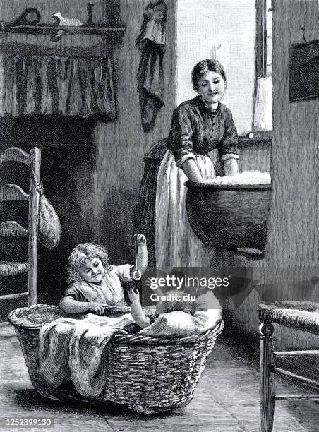 girl plays with a baby in the basket, mother at the washing tub - antique washing machine stock illustrations