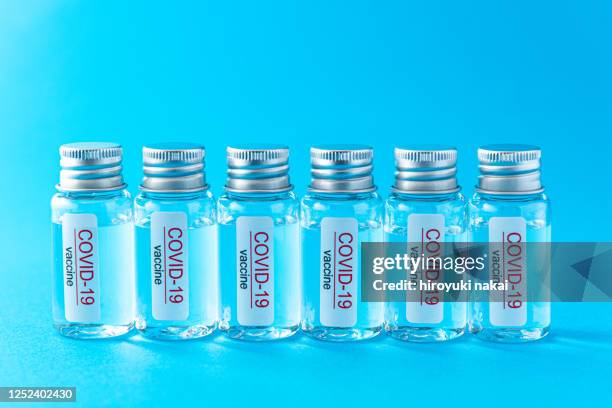 coronavirus vaccine - covid 19 vaccine vial stock pictures, royalty-free photos & images