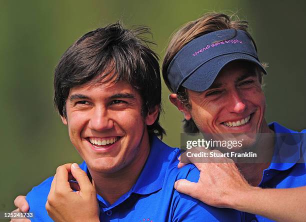 Matteo Manassaro and Noicolas Colsaerts of the Continental Europe team look happy during the second days fourball matches at the Vivendi Seve Trophy...