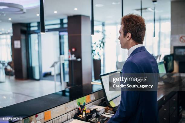 Hotel Receptionist Job Using Computer Hotel Working Laptop Photos and Premium High Res Pictures - Getty Images