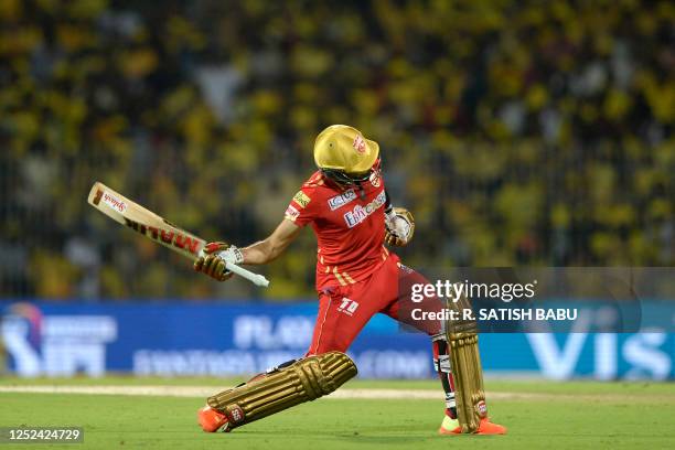 Punjab Kings' Sikandar Raza celebrates his team's win at the end of the Indian Premier League Twenty20 cricket match between Chennai Super Kings and...