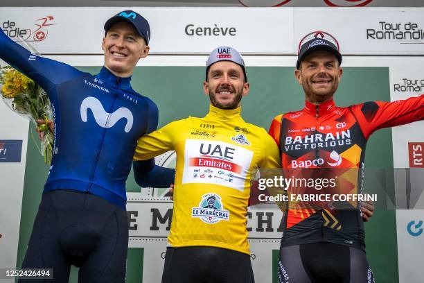 LtoR, 2nd placed US rider Matteo Jorgenson, winner of the Tour de Romandie Britain's Adam Yates and 3rd placed Italy's Damiano Caruso pose on the...