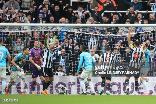 Newcastle United's Brazilian midfielder Bruno Guimaraes celebrates after scoring his team second goal during the English Premier League football...