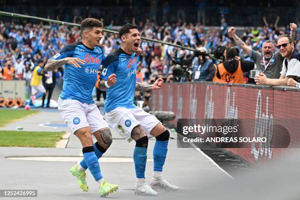 Napoli's Uruguayan defender Mathias Olivera celebrates with Napoli's Italian defender Giovanni Di Lorenzo after opening the scoring during the...