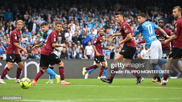 Napoli's Uruguayan defender Mathias Olivera shoots to open the scoring during the Italian Serie A football match between Napoli and Salernitana on...