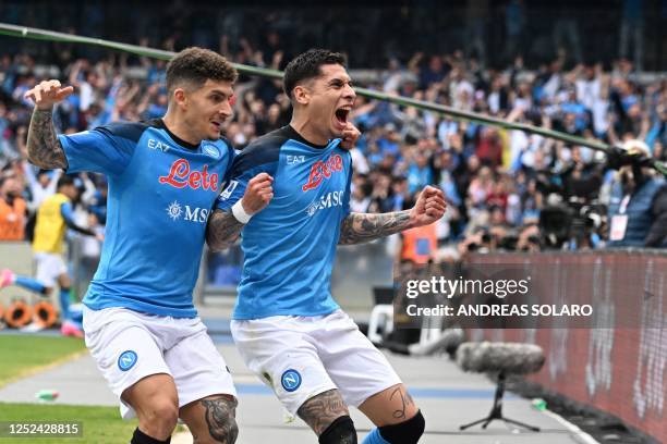 Napoli's Uruguayan defender Mathias Olivera celebrates with Napoli's Italian defender Giovanni Di Lorenzo after opening the scoring during the...