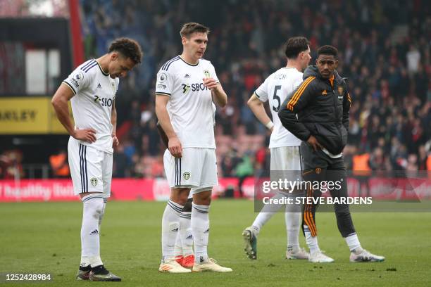 Leeds United's players react to their defeat on the pitch after the English Premier League football match between Bournemouth and Leeds United at the...