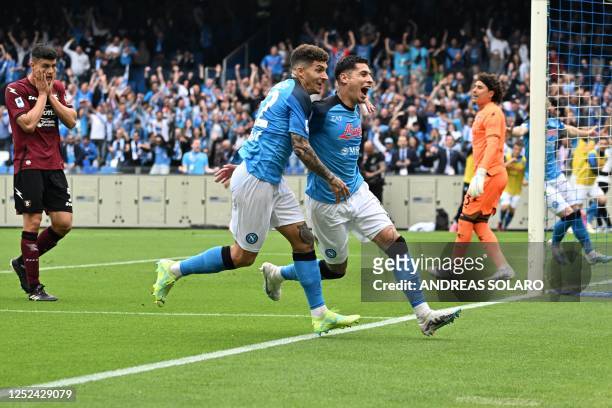 Napoli's Uruguayan defender Mathias Olivera celebrates with Napoli's Italian defender Giovanni Di Lorenzo after opening the scoring during the...