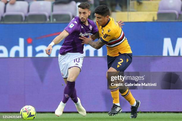 Gaetano Castrovilli of ACF Fiorentina in action against Bruno Amione of UC Sampdoria during the Serie A match between ACF Fiorentina and UC Sampdoria...