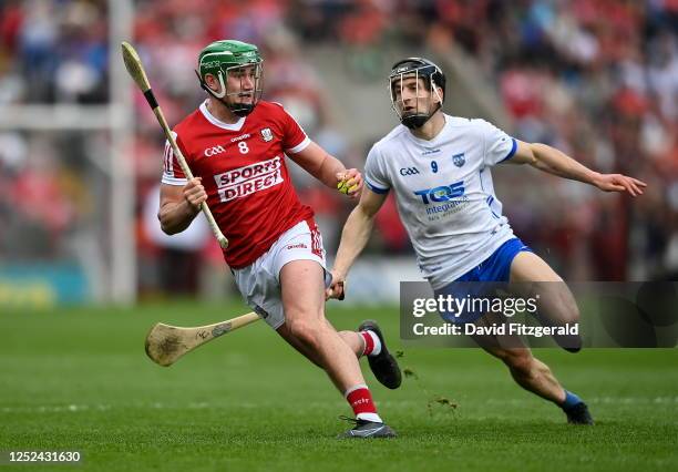 Cork , Ireland - 30 April 2023; Brian Roche of Cork in action against Jamie Barron of Waterford during the Munster Senior Hurling Championship...