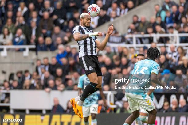 Joelinton of Newcastle United heads the ball during the Premier League match between Newcastle United and Southampton FC at St. James Park on April...