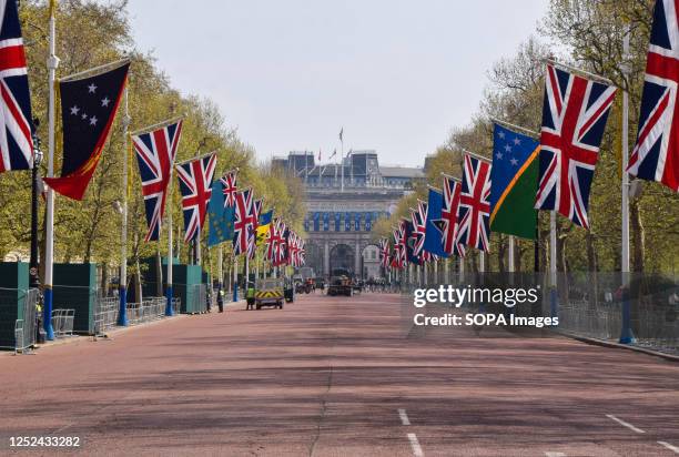 Union Jacks and flags of Commonwealth countries decorate The Mall leading to the Admiralty Arch ahead of the coronation of King Charles III, which...