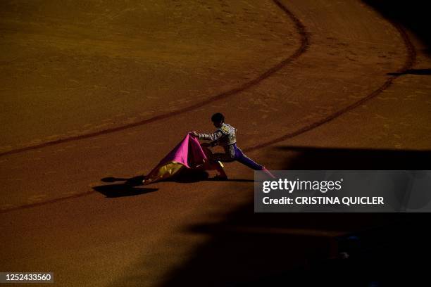 Spanish bullfighter Pablo Aguado warms up before a bullfight during the Feria de Abril bullfighting festival at La Maestranza bullring in Seville on...