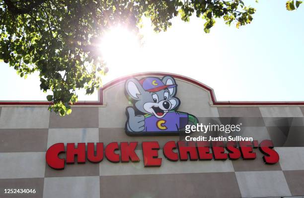 Sign is posted on the exterior of a Chuck E. Cheese's restaurant on June 25, 2020 in Pinole, California. CEC Entertainment, the parent company of...
