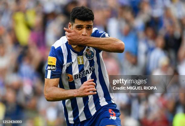 Porto's Iranian forward Mehdi Taremi celebrates after scoring his team's first goal during the Portuguese league football match between FC Porto and...