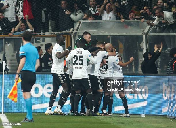 Amir Hadziahmetovic of Besiktas celebrates with teammates after scoring his team's second goal during the Super Lig match between Besiktas and...