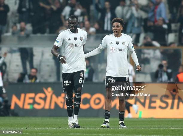 Omar Colley and Gedson Fernandes of Besiktas celebrates victory during the Super Lig match between Besiktas and Galatasaray at Vodafone Park on April...