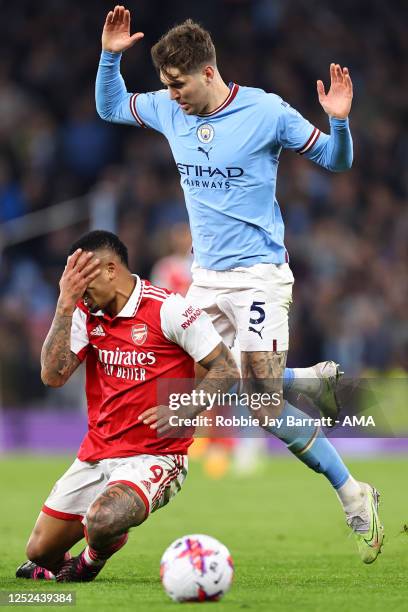 Gabriel Jesus of Arsenal and John Stones of Manchester City during the Premier League match between Manchester City and Arsenal FC at Etihad Stadium...