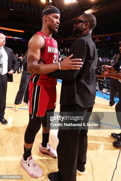 Jimmy Butler of the Miami Heat speaks with Dwyane Wade after Game 1 of the Eastern Conference Semi-Finals of the 2023 NBA Playoffs on April 30, 2023...