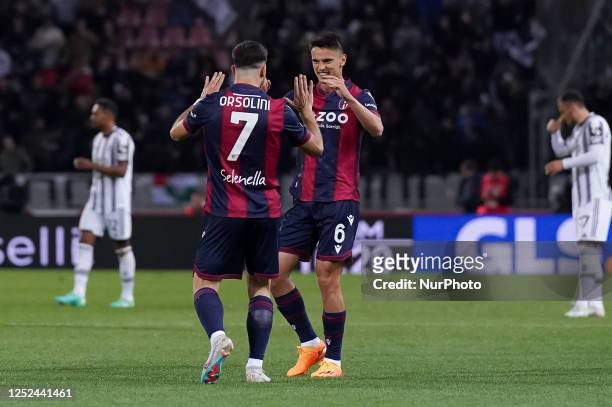 Riccardo Orsolini of Bologna FC celebrates with Nikola Moro of Bologna FC after scoring first goal during the Serie A match between Bologna FC and...