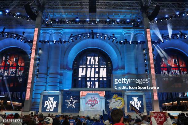 The stage is lit up in blue as it announces The Pick Is In for the Dallas Cowboys in the third round of the NFL Draft on April 28, 2023 at Union...
