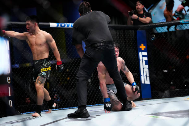 Song Yadong celebrates his victory over Ricky Simon fight in a Bantamweight bout for UFC Fight Night on April 29 at UFC Apex in Las Vegas, NV.