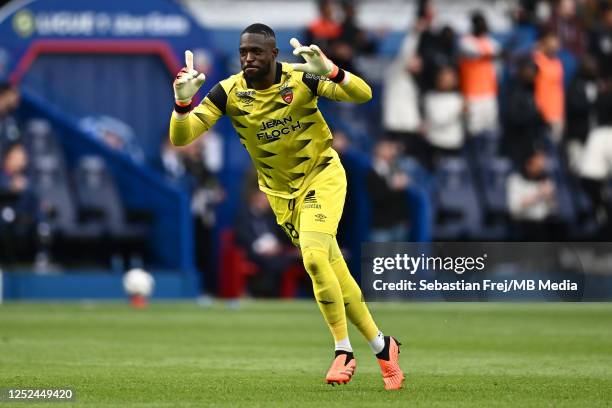 Yvon Mvogo of FC Lorient celebrate during the Ligue 1 match between Paris Saint-Germain and FC Lorient at Parc des Princes on April 30, 2023 in...