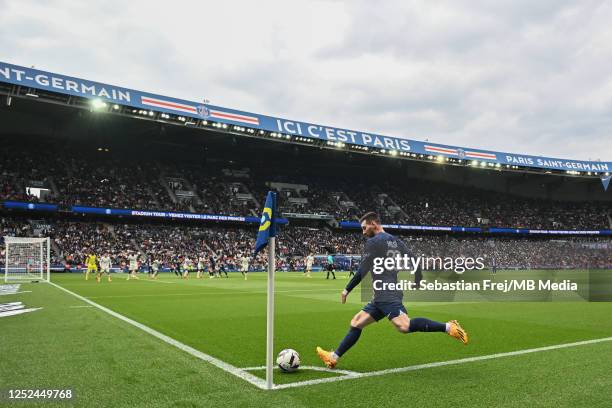 Lionel Messi of Paris Saint-Germain takes a corner kick during the Ligue 1 match between Paris Saint-Germain and FC Lorient at Parc des Princes on...