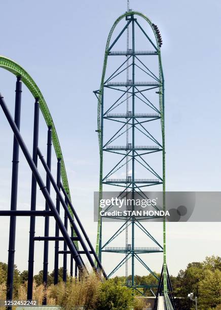 Riders approach the summit of the "Kingda Ka" roller coaster 19 May at Six Flags amusement park in Jackson, New Jersey. Jeremy Delong bid 1,692 USD...