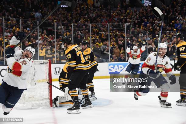 The Florida Panthers celebrate their third period goal against the Boston Bruins in Game Seven of the First Round of the 2023 Stanley Cup Playoffs at...