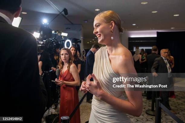 Dasha Navalnaya speaks to a reporter on the red carpet of the White House Correspondents Dinner hosted at the Washington Hilton in Washington, D.C.,...