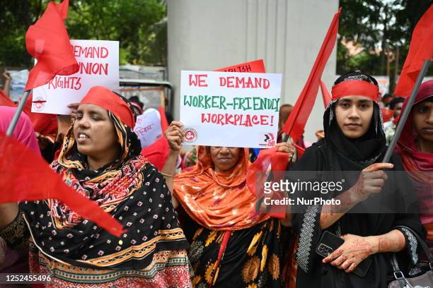 Bangladeshi garment workers and other labor organization activists take part in a rally to mark May Day or International Workers' Day in Dhaka,...