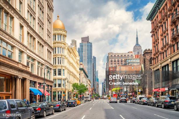 6th avenue in chelsea new york city usa - avenue of the americas stock pictures, royalty-free photos & images