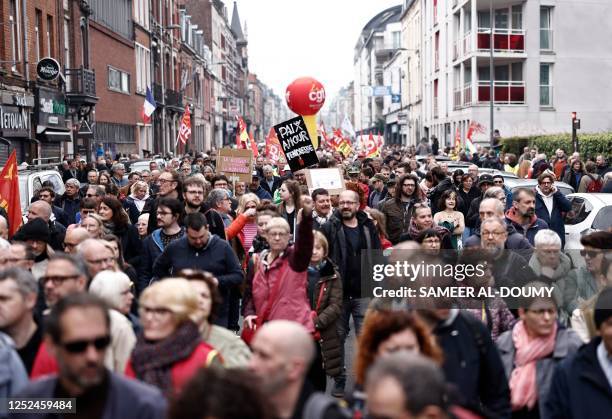 Protestors take part in a demonstration on May Day , to mark the international day of the workers, more than a month after the government pushed an...